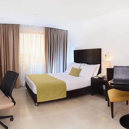 Hotel Millenium Barrancabermeja Buitenkant foto